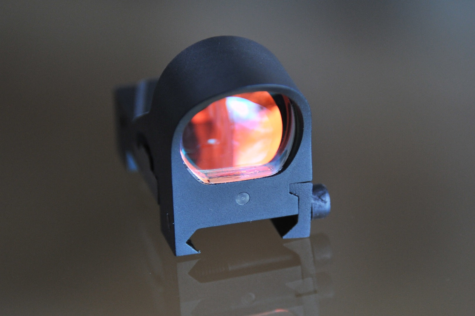Red Dot Auto Light Sensing Sight built in sun shade, good for pistols.
